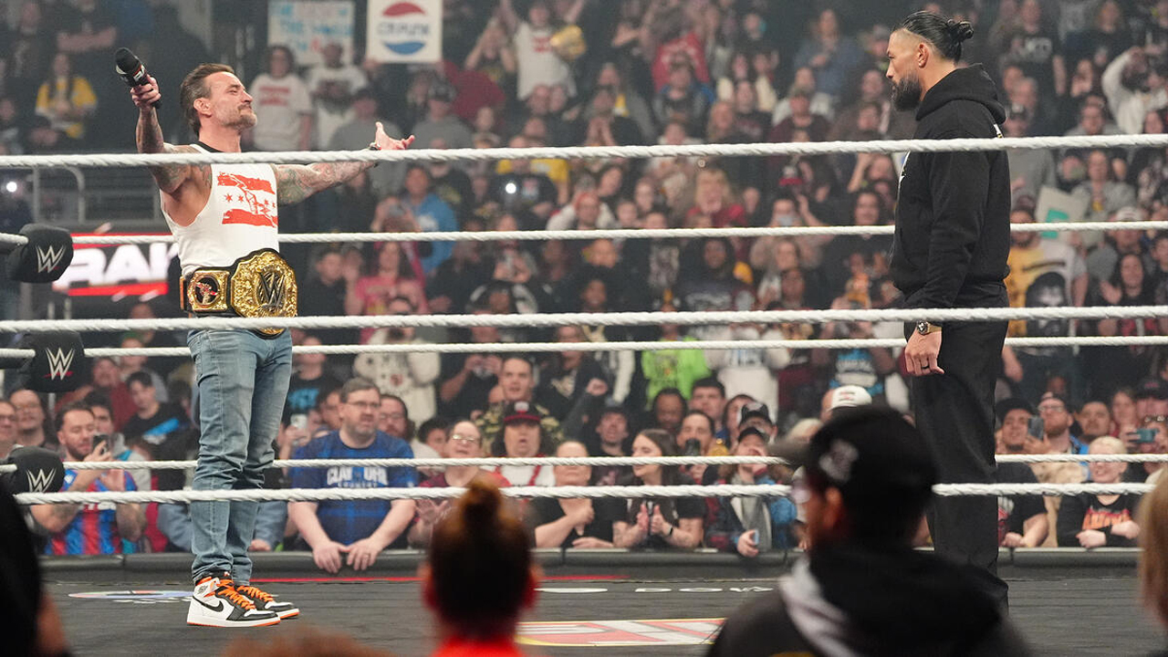 WWE Raw CM Punk Roman Reigns
