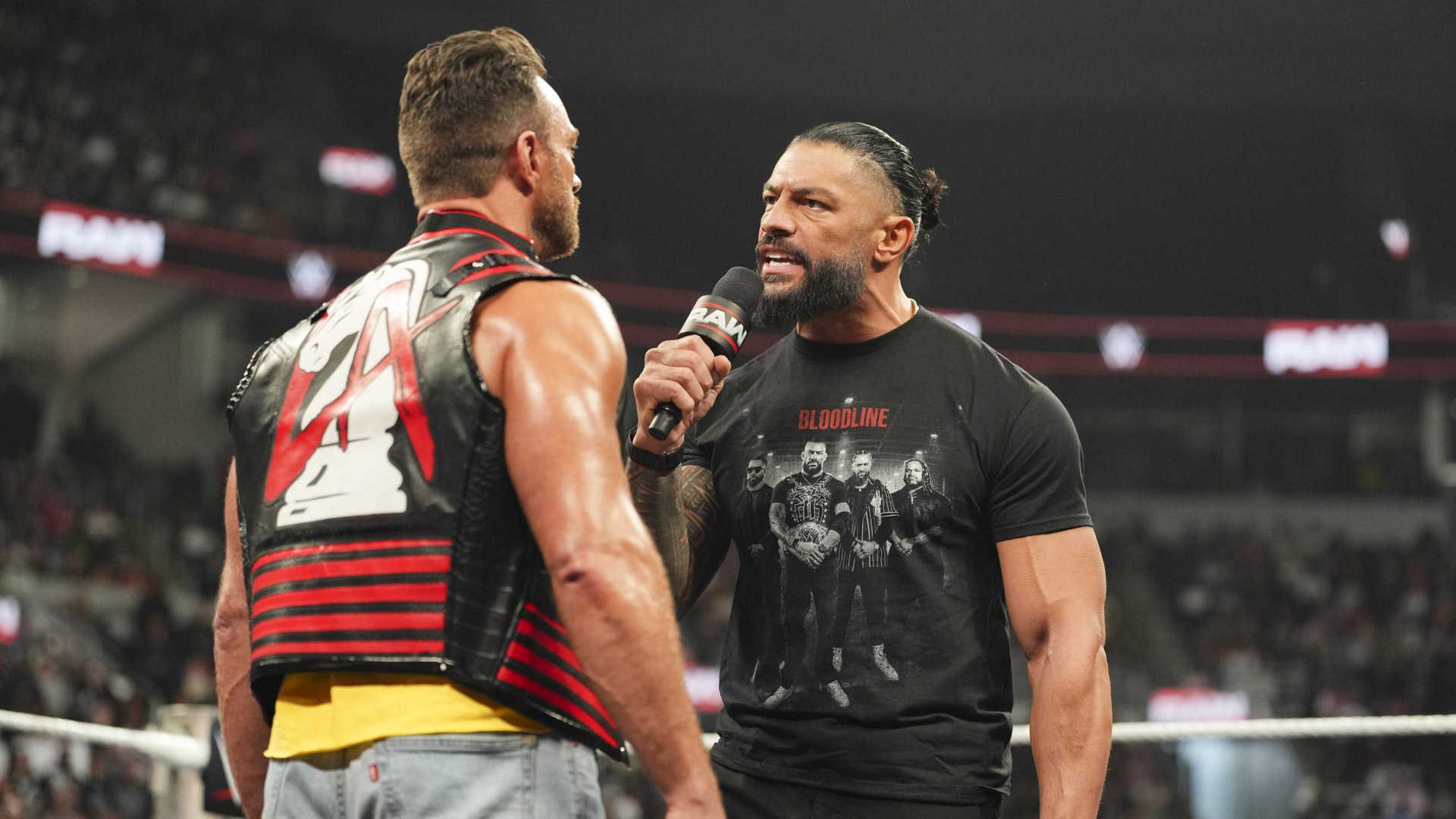 Roman Reigns LA Knight